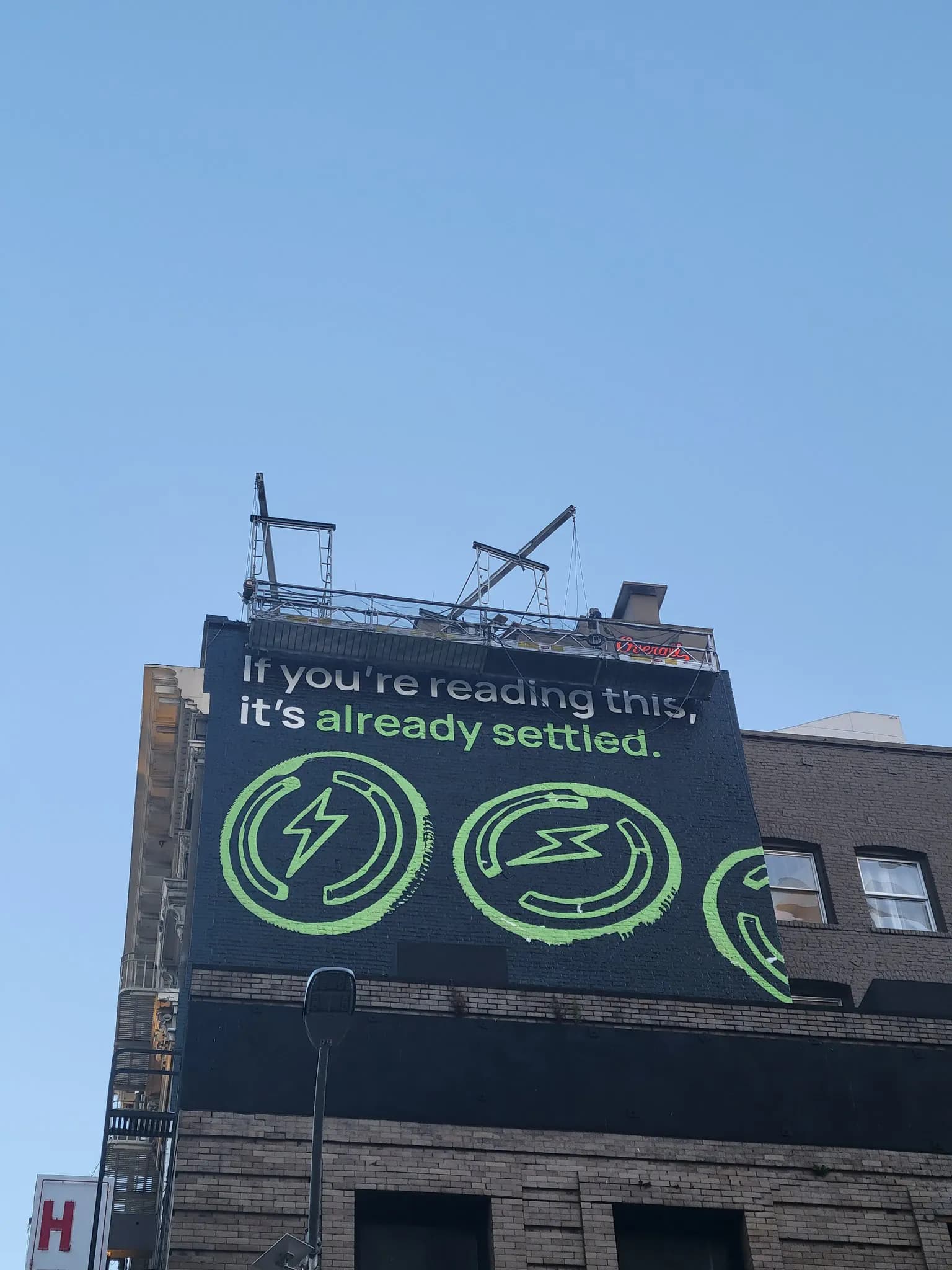 AI-themed billboard in San Francisco reading if you are reading this it is already settled