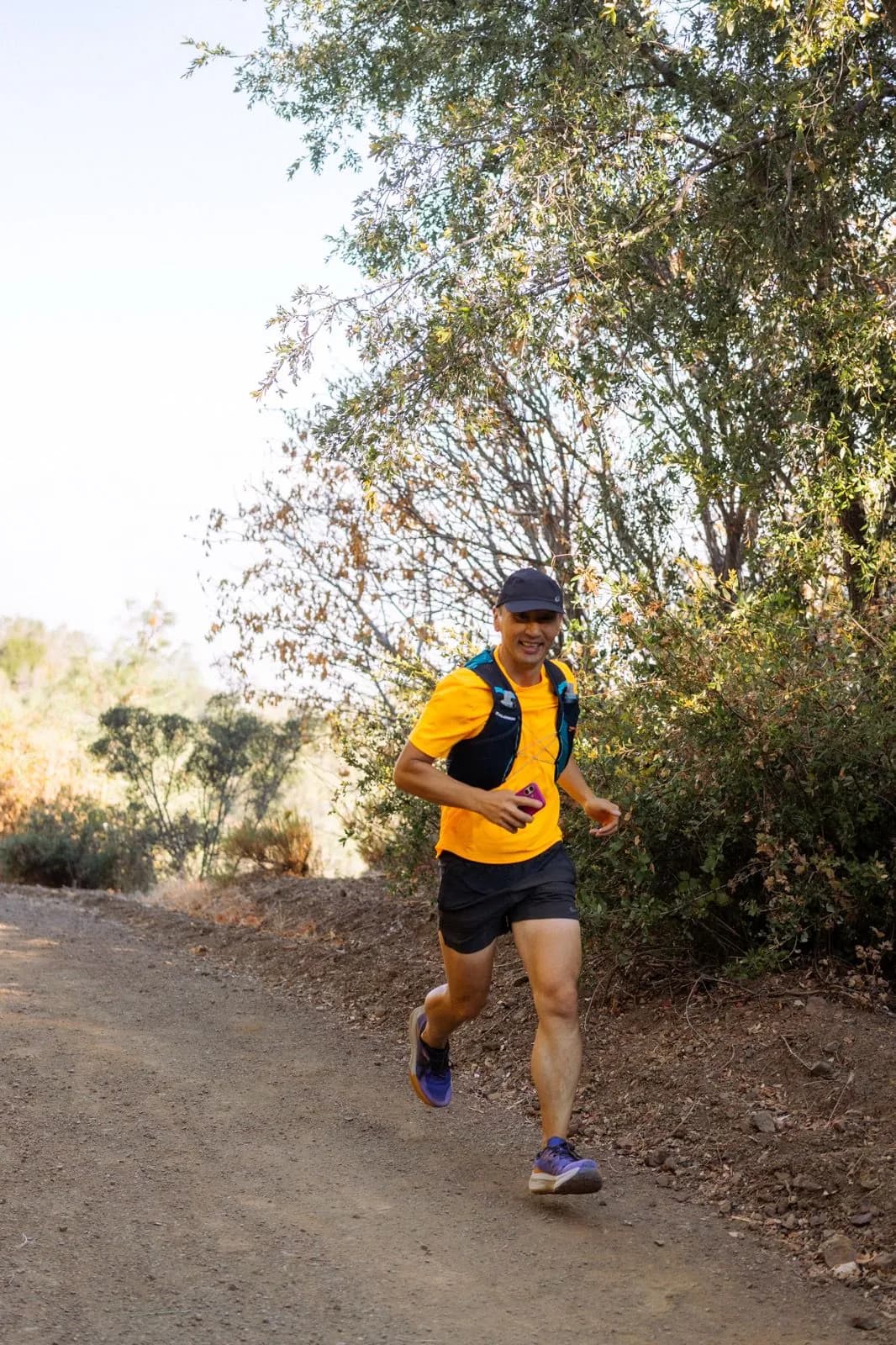 Tim running on a shaded Mount Diablo trail