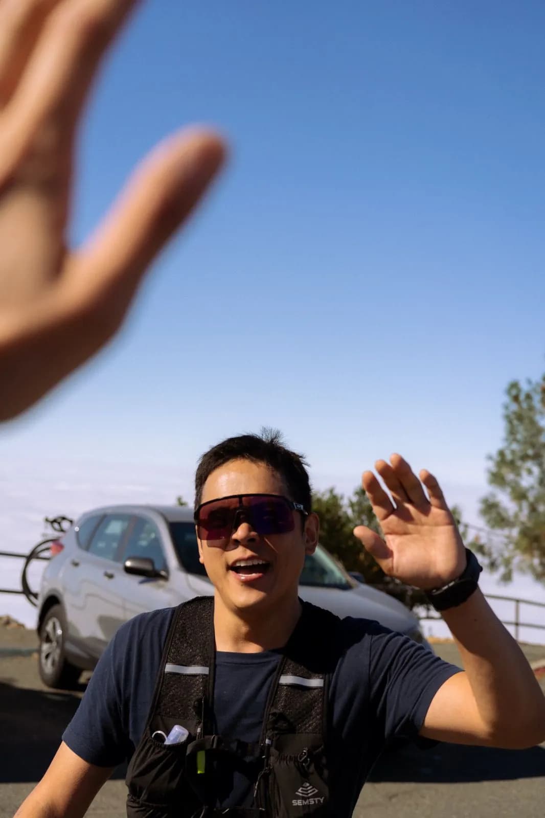 Club member waving after the Mount Diablo run