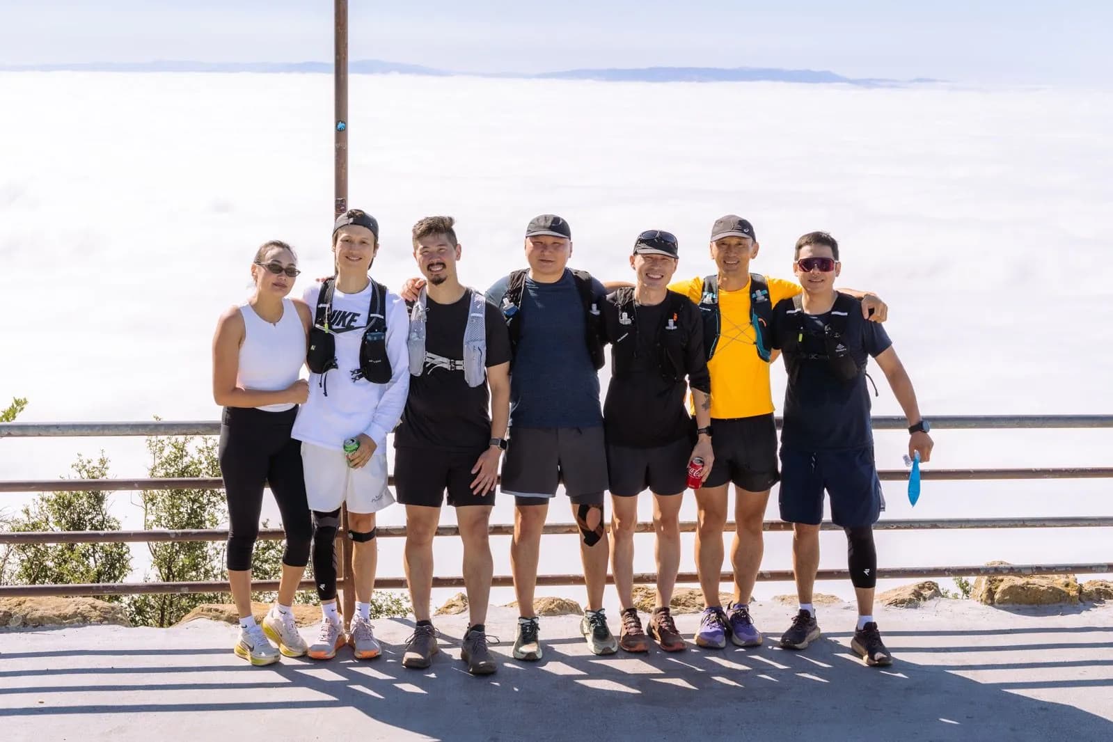 Seven Iron Horse Run Club members together above the clouds at Mount Diablo
